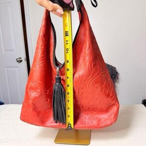 Red Floral-Embossed Hobo Bag with Tassel